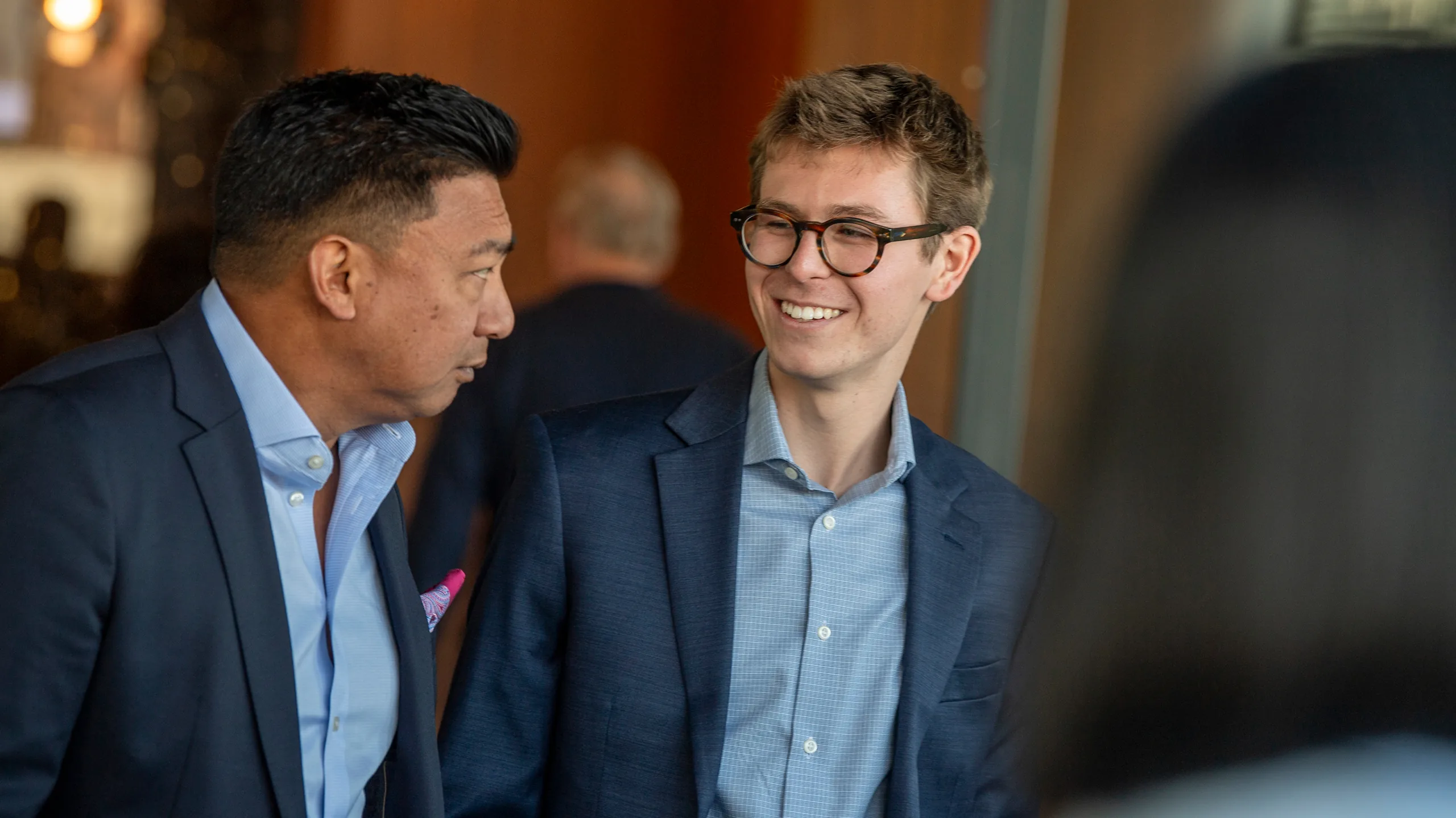 Young professionals talking at a GLAR event