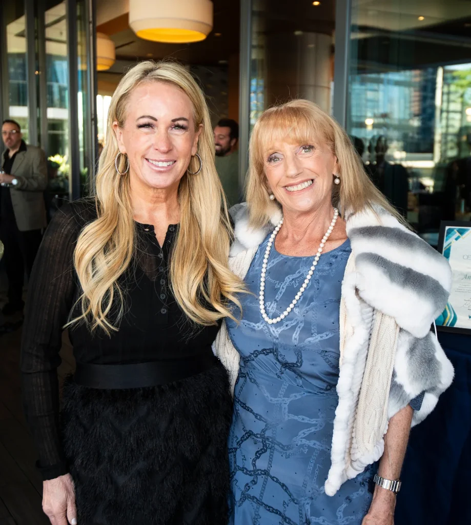 Two GLAR members at an event