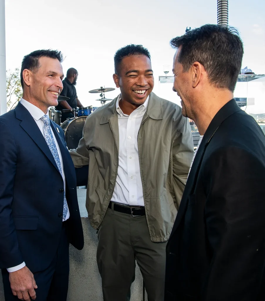 Three GLAR members laughing together
