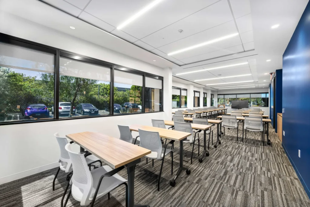 GLAR main level training room with rows of tables and chairs