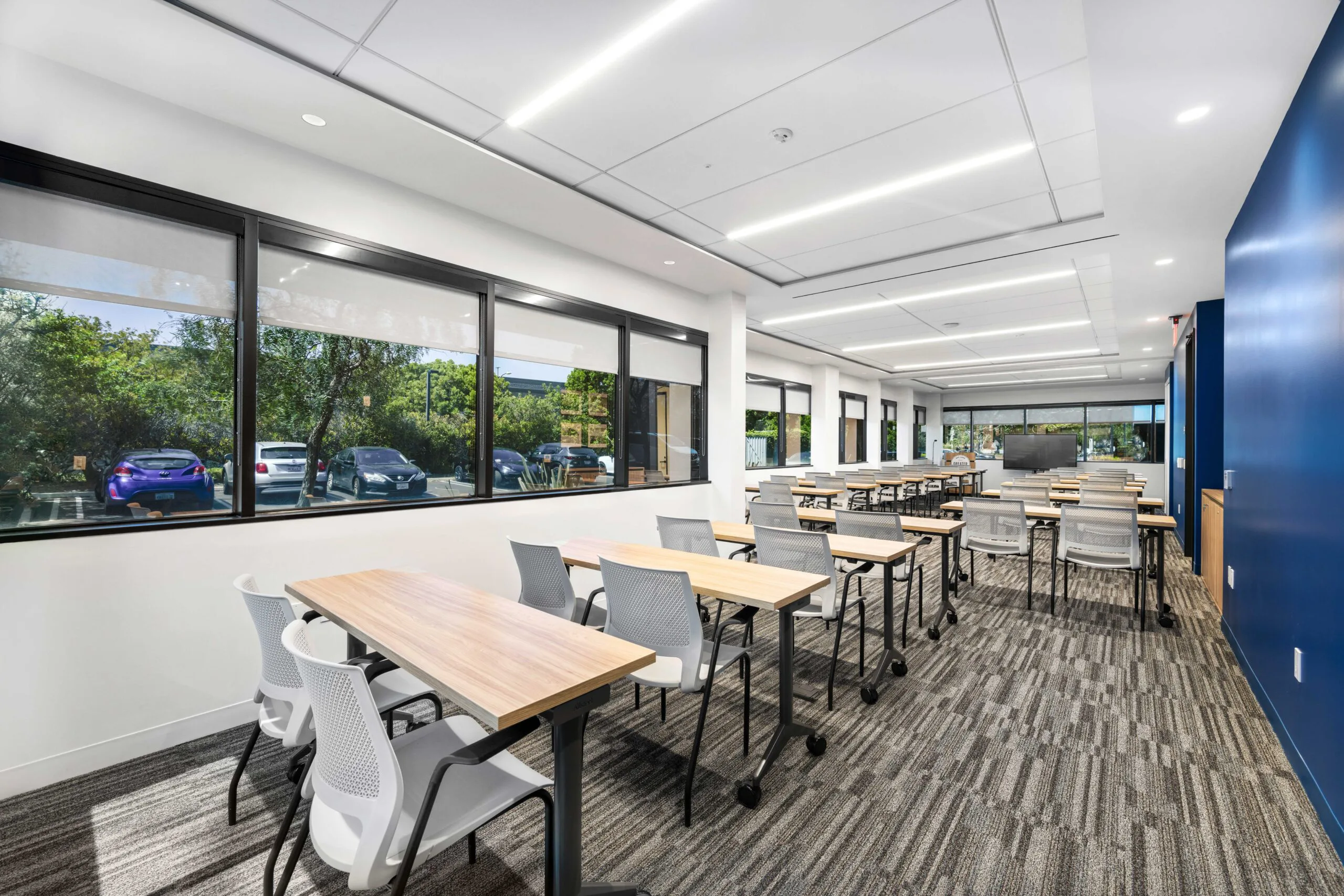 GLAR main level training room with rows of tables and chairs