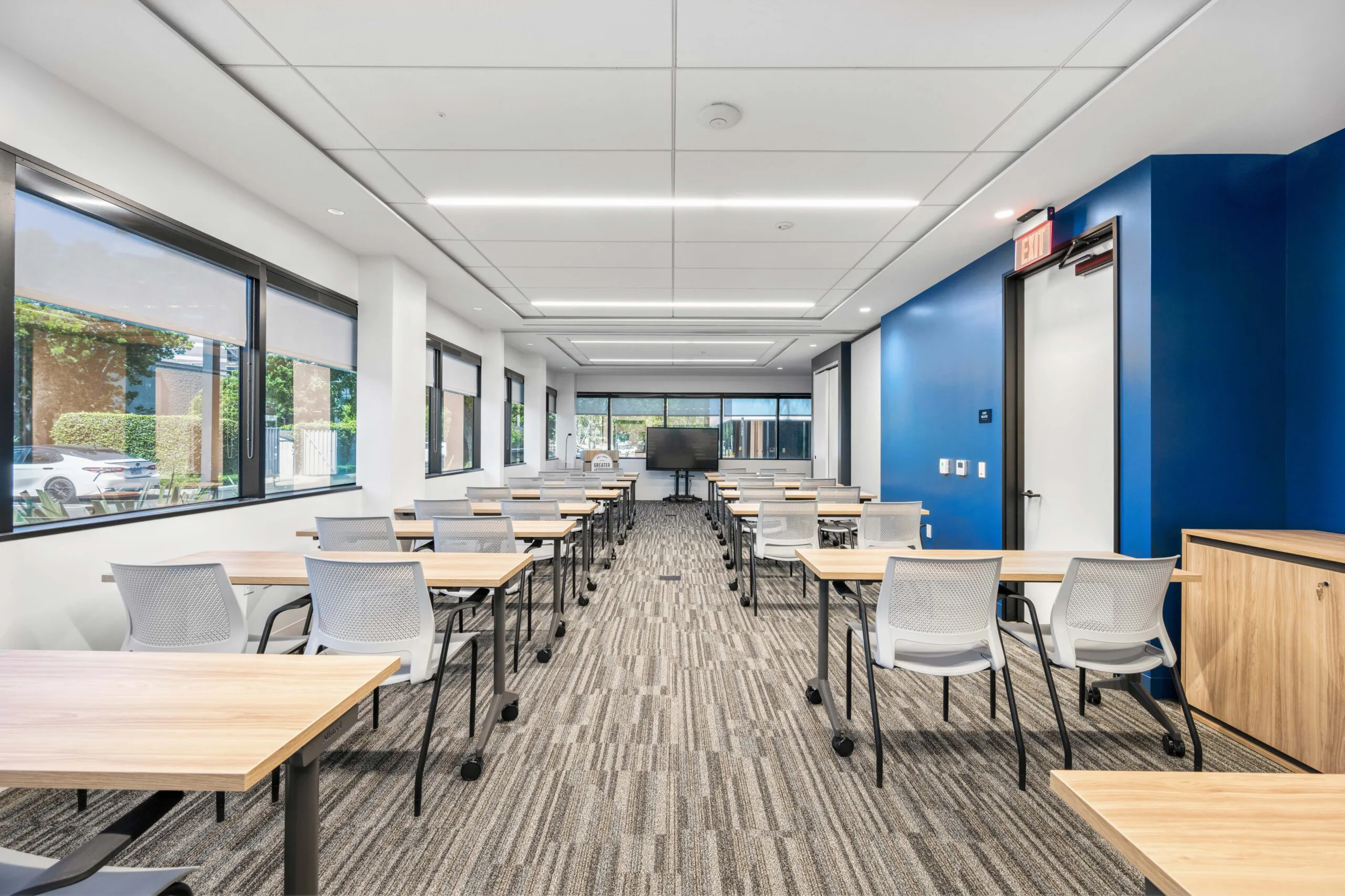 GLAR upper level training room with tables and chairs